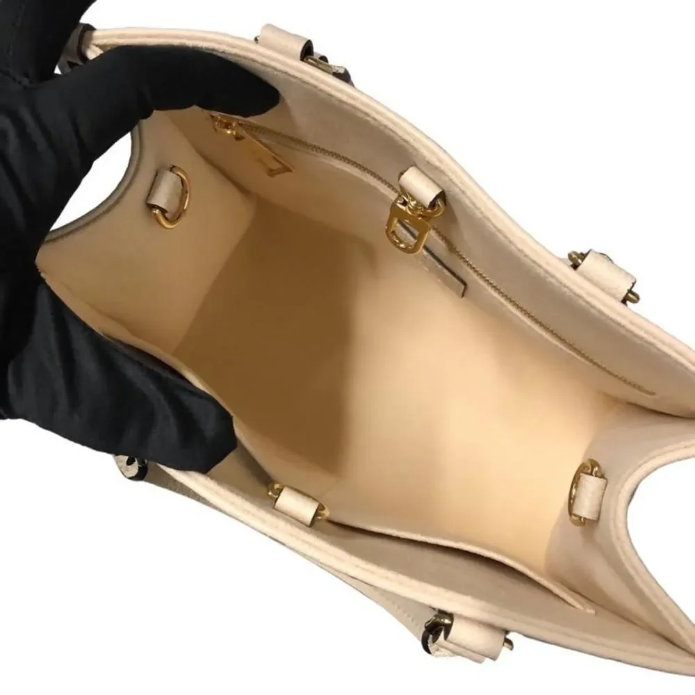 Louis Vuitton On The Go PM Shoulder Bag Creme